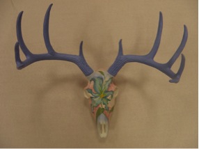 “Deer Skull with Lily” by Jane Lavino is one of the mounts available for sale at the Trophy Art fundraiser.