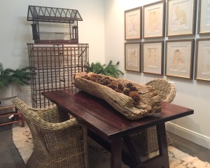 WRJ Design’s new WRJ Rustic showroom includes such unique pieces as a wooden Asian trough used as table centerpiece and a vintage Philadelphia birdhouse shown atop a rusted metal wine rack.