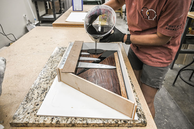 Crafting the Rock Block means marrying together stone, wood and resin. All of this is accomplished in the New West KnifeWorks facility in Victor, Idaho.