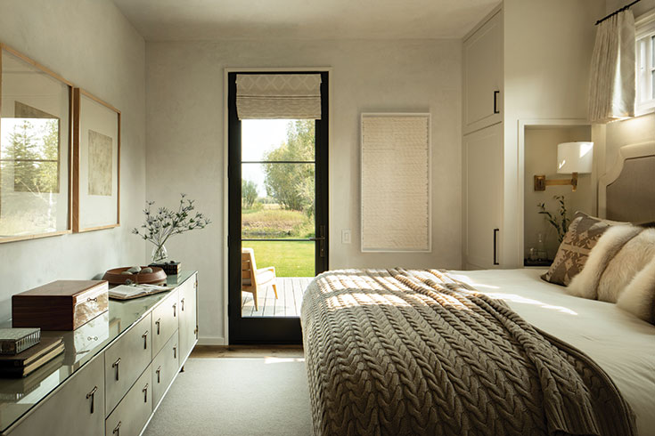 Luscious textures envelope occupants of the primary bedroom. The leather façade and bronze pulls of the BDDW chest of drawers contrast the softness of the bed linens and cotton- cashmere headboard.