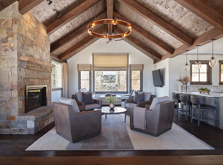 Chief cliff stone became an aesthetic through line, gracing not only the fireplace but the exterior as well in the great room, its texture contrasts the subtle palette.